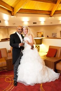 Portrait of bride and groom inside the Marriott Hotel in Waltham Abbey, Essex